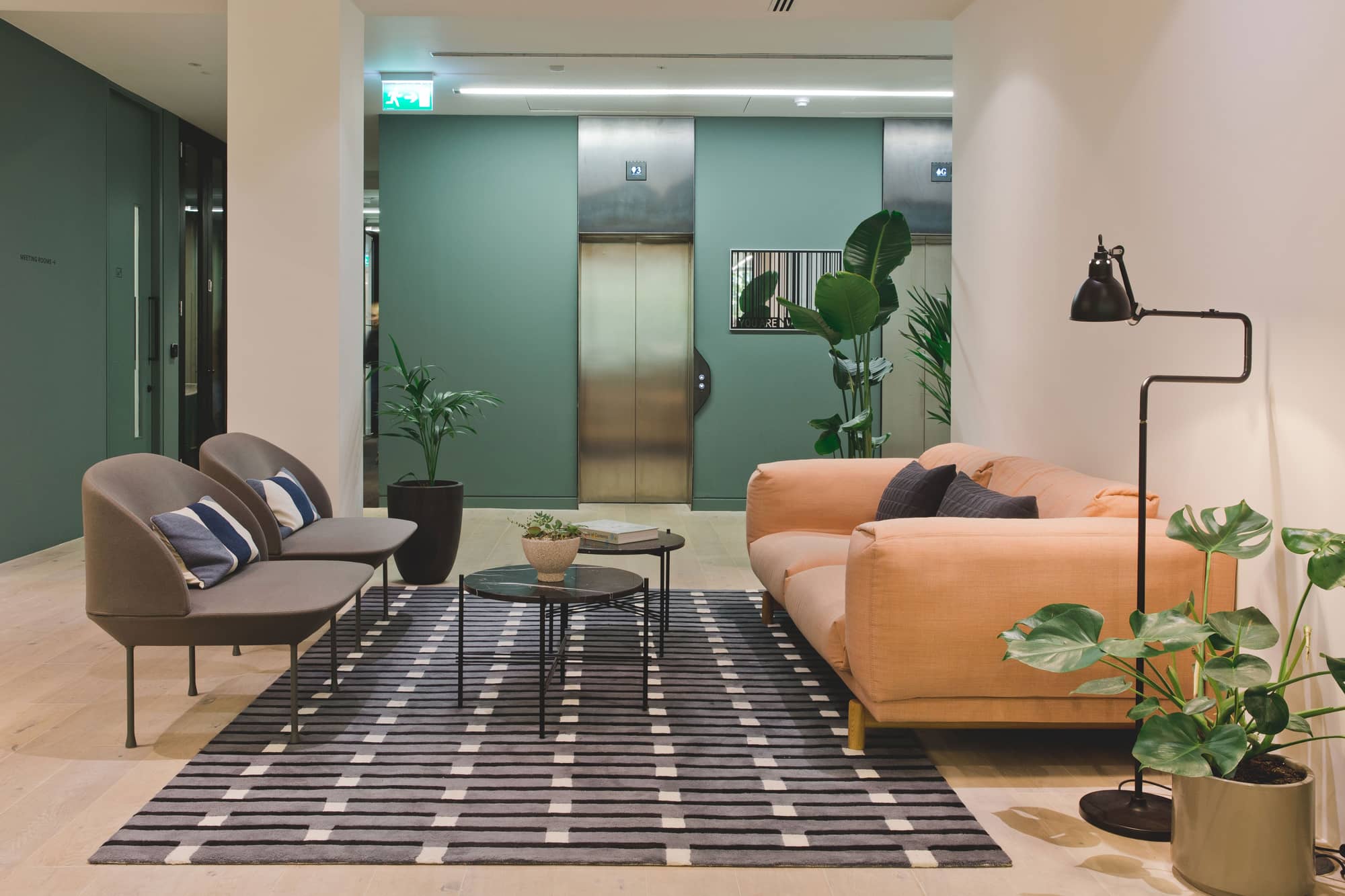 Seating area with two sofas and a coffee table at 2 Stephen Street.